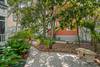 SIDE AREA OF COTTAGE; LARGE FENCED PRIVATE CORNER LOT SIDE AREA OF COTTAGE; LARGE FENCED PRIVATE CORNER LOT