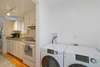 WASHER AND DRYER OFF OF KITCHEN