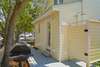 OUTDOOR CHARCOAL GRILL & ENCLOSED OUTDOOR SHOWER