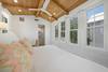 WALL OF WINDOWS WITH SHADES IN MASTER BEDROOM WALL OF WINDOWS WITH SHADES IN MASTER BEDROOM