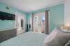 FULL BED ROOM WITH FLATSCREEN, DRESSER AND DECK ACCESS