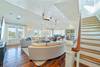 LIVING AREA WITH STAIRCASE TO THIRD FLOOR OPEN DECK W/GULF VIEWS LIVING AREA WITH STAIRCASE TO THIRD FLOOR OPEN DECK W/GULF VIEWS