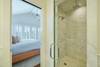 GLASS ENCLOSED WALK IN SHOWER WITH DUAL SHOWER HEADS GLASS ENCLOSED WALK IN SHOWER WITH DUAL SHOWER HEADS