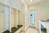 FOYER MUDROOM W/BUILT IN STORAGE & CUBBYS FOYER MUDROOM W/BUILT IN STORAGE & CUBBYS