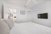 QUEEN ROOM W/MOUNTED FLAT SCREEN & CLOSET QUEEN ROOM W/MOUNTED FLAT SCREEN & CLOSET