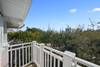 BALCONY OVER LOOKS SIDE YARD, DIRECTLY ACROSS FROM THE BEACH BALCONY OVER LOOKS SIDE YARD, DIRECTLY ACROSS FROM THE BEACH