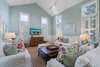LIVING AREA W/VAULTED CEILINGS & LARGE FLAT SCREEN TV