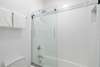 GLASS ENCLOSED TUB & SHOWER COMBINATION