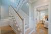 STAIRCASE TO UPPER LEVEL LIVING AREAS