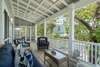 LARGE SCREENED PORCHES UP W/MULTIPLE DINING & LOUNGE AREAS
