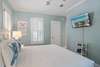 KING W/LARGE MOUNTED FLAT SCREEN TV