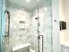 GLASS ENCLOSED MARBLE SHOWER W/RAIN & SHOWER WAND HEADS