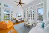 LIVING AREA WITH FLOOR TO CEILING WINDOWS LIVING AREA WITH FLOOR TO CEILING WINDOWS