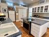 KITCHEN VIEW TO CENTER ISLAND STOVE TOP KITCHEN VIEW TO CENTER ISLAND STOVE TOP