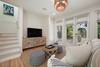 MODERN LIVING AREA WITH DESIGNER FURNISHINGS THROUGHOUT MODERN LIVING AREA WITH DESIGNER FURNISHINGS THROUGHOUT