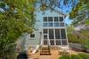 REAR OF HOME W/OUTDOOR DINING FOR FOUR & 2 ADIRONDACK SEATS REAR OF HOME W/OUTDOOR DINING FOR FOUR & 2 ADIRONDACK SEATS