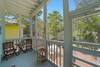 SCREENED REAR PORCH W/BISTRO SEATING OVER LOOKING FENCED YARD SCREENED REAR PORCH W/BISTRO SEATING OVER LOOKING FENCED YARD