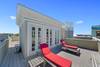 OPEN AIR ROOFTOP DECK WITH LOUNGE CHAIRS FOR TWO OPEN AIR ROOFTOP DECK WITH LOUNGE CHAIRS FOR TWO