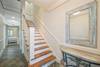 FIRST LEVEL OF HOME FOYER AND STAIRS TO SECOND STORY LIVING FIRST LEVEL OF HOME FOYER AND STAIRS TO SECOND STORY LIVING