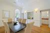 DINING AREA WITH WET BAR & HALF BATH DINING AREA WITH WET BAR & HALF BATH