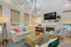 LIVING AREA W/LARGE MOUNTED SMART TV & SONOS LIVING AREA W/LARGE MOUNTED SMART TV & SONOS