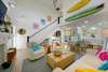 OPEN, TASTEFUL LIVING AREA W HIGH CEILINGS AND SEATING FOR ALL