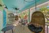 OPEN AIR SHARED PORCH W/HANGING SWINGS