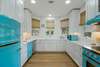 KITCHEN W/RETRO APPLIANCES, QUARTZ COUNTERS, & CUSTOM CABINETS