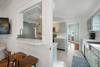 FULLY EQUIPPED KITCHEN WITH BREAKFAST BAR SEATING FOR 2 FULLY EQUIPPED KITCHEN WITH BREAKFAST BAR SEATING FOR 2