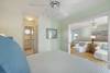 QUEEN ROOM WITH PRIVACY DOORS FACING LIVING AREA QUEEN ROOM WITH PRIVACY DOORS FACING LIVING AREA