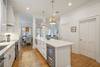KITCHEN WITH MINI BEVERAGE & WINE FRIDGE IN CENTER ISLAND KITCHEN WITH MINI BEVERAGE & WINE FRIDGE IN CENTER ISLAND