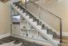 STAIRCASE LEADING TO SECOND STORY LIVING AREAS