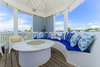 OPEN TOWER DECK W/ROUND SOFA, FIRE PIT, & SLIGHT GULF VIEWS