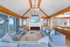 LARGE OPEN LIVING ROOM WITH FLATSCREEN TV AND FIREPLACE LARGE OPEN LIVING ROOM WITH FLATSCREEN TV AND FIREPLACE