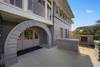 ENTRY NEXT TO OPEN FRONT PORCH W/OUTDOOR FIREPLACE & GRILL ENTRY NEXT TO OPEN FRONT PORCH W/OUTDOOR FIREPLACE & GRILL