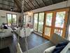 OPEN LOUNGE AREA & BED SWING ON SCREENED ON FRONT PORCH OPEN LOUNGE AREA & BED SWING ON SCREENED ON FRONT PORCH