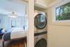 STACKED FULL SIZE WASHER AND DRYER IN BATHROOM STACKED FULL SIZE WASHER AND DRYER IN BATHROOM