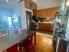 FULLY EQUIPPED KITCHEN AND DINING AREA ON SECOND LEVEL FULLY EQUIPPED KITCHEN AND DINING AREA ON SECOND LEVEL