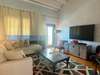 OPEN LIVING ON SECOND LEVEL WITH BALCONY