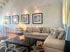 OPEN LIVING WITH LARGE SECTIONAL ON SECOND LEVEL
