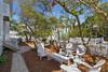 LARGE, SHADED YARD WITH LOUNGE SEATING AREAS LARGE, SHADED YARD WITH LOUNGE SEATING AREAS