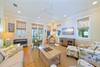 LARGE FLAT SCREEN MOUNTED TV; DUAL CLUB CHAIRS LARGE FLAT SCREEN MOUNTED TV; DUAL CLUB CHAIRS