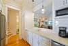 PLENTY OF BUILT IN CUSTOM CABINETS & STORAGE PLENTY OF BUILT IN CUSTOM CABINETS & STORAGE