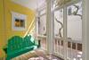 PEACEFUL PORCH WITH OUTDOOR SWING OVERLOOKING YARD PEACEFUL PORCH WITH OUTDOOR SWING OVERLOOKING YARD