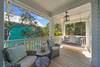LARGE OPEN AIR PORCH W/SEATING FOR TWO & SWING LARGE OPEN AIR PORCH W/SEATING FOR TWO & SWING