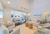 LARGE SOFA, FOUR CLUB CHAIRS, VAULTED CEILINGS LARGE SOFA, FOUR CLUB CHAIRS, VAULTED CEILINGS