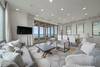 OPEN LIVING WITH FLATSCREEN TV AND LARGE SOFAS OPEN LIVING WITH FLATSCREEN TV AND LARGE SOFAS
