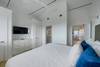 KING W/MOUNTED FLAT SCREEN TV & CUSTOM BUILT IN STORAGE KING W/MOUNTED FLAT SCREEN TV & CUSTOM BUILT IN STORAGE