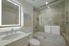 SHARED HALL FULL BATH, TUB/COMBO SHOWER, LIGHTED MIRROR SHARED HALL FULL BATH, TUB/COMBO SHOWER, LIGHTED MIRROR