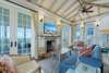 THIRD FLOOR LIVING AREA WITH FLATSCREEN TV AND FIREPLACE